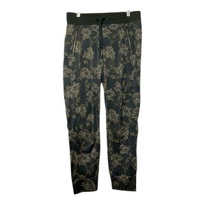 Women’s Athleta Trekkie North Printed Jogger pants with floral design, size 8